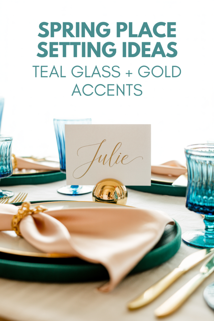 Spring place setting with woven textures, teal crystal glassware, a soft pink napkin, and a gold place card holder.
